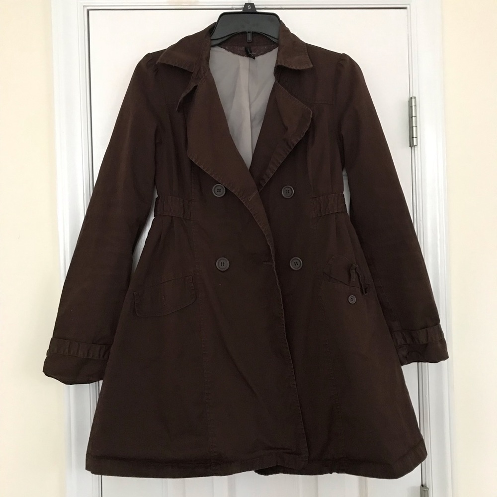 Brown trench coat with a cute bow in the back